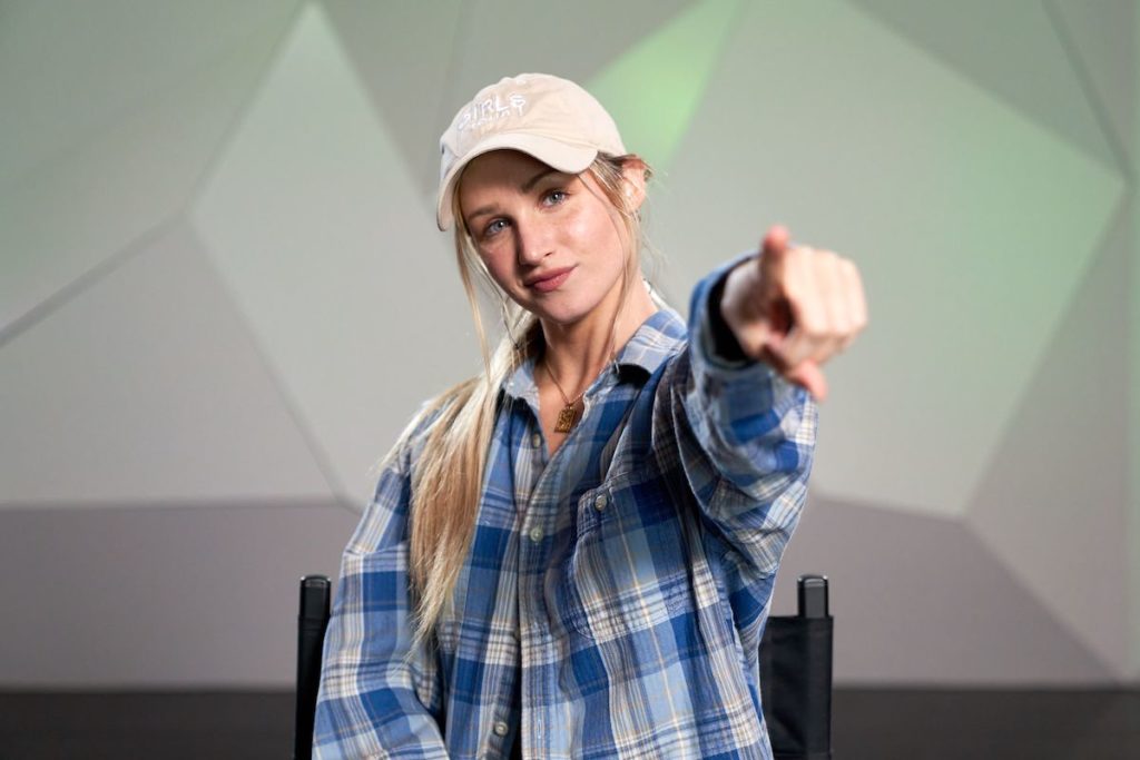 dancer delany glazer smiling and point to the camera