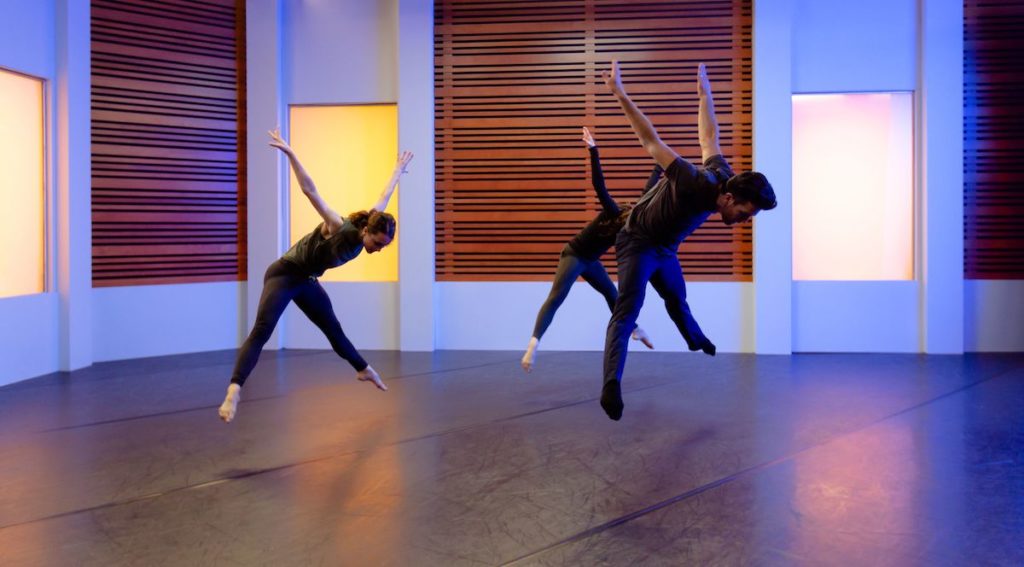 teddy forance and 2 other dancers doing a jump with arms in air and facing down at cli studios