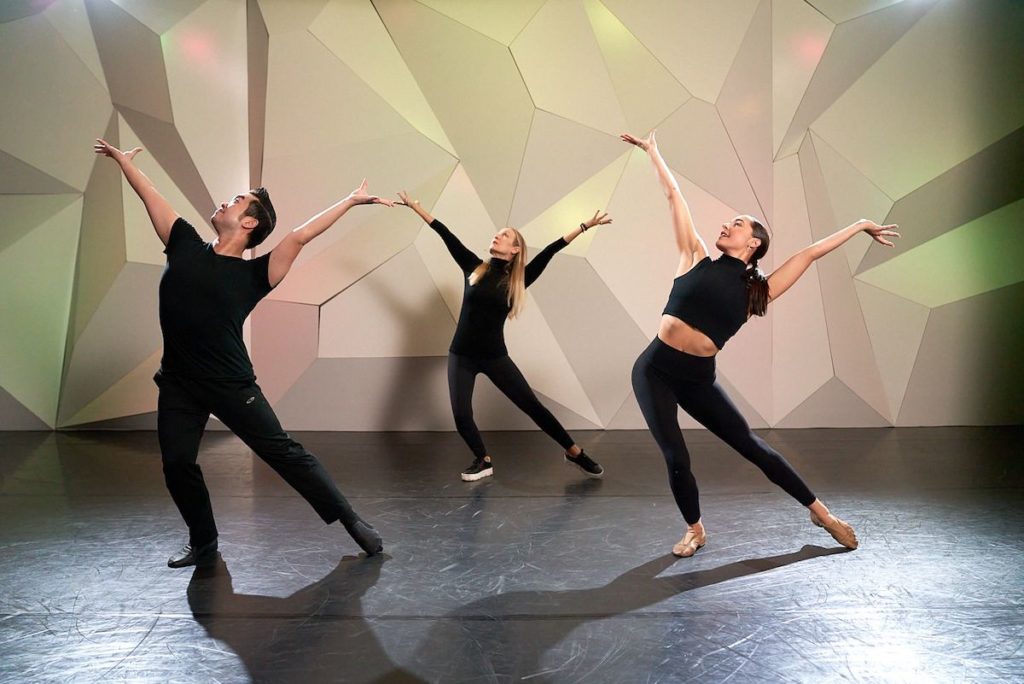 choreographer marguerite derricks and assistants wearing all black leggings and shirts in a jazz dance class 