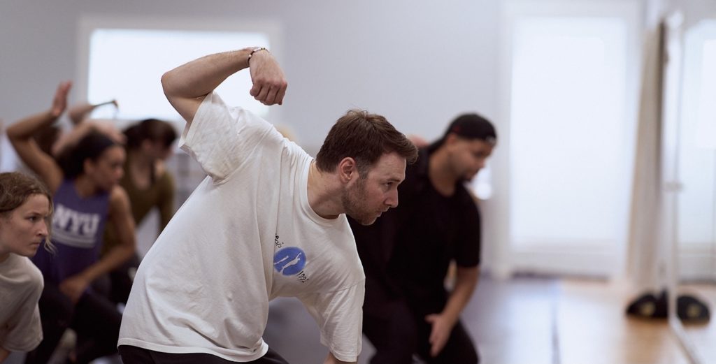 Choreographer Chris Scott teaching in a dance studio