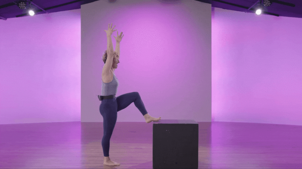 Katie Scharr demonstrating hip flexor lift off at cli studios. 