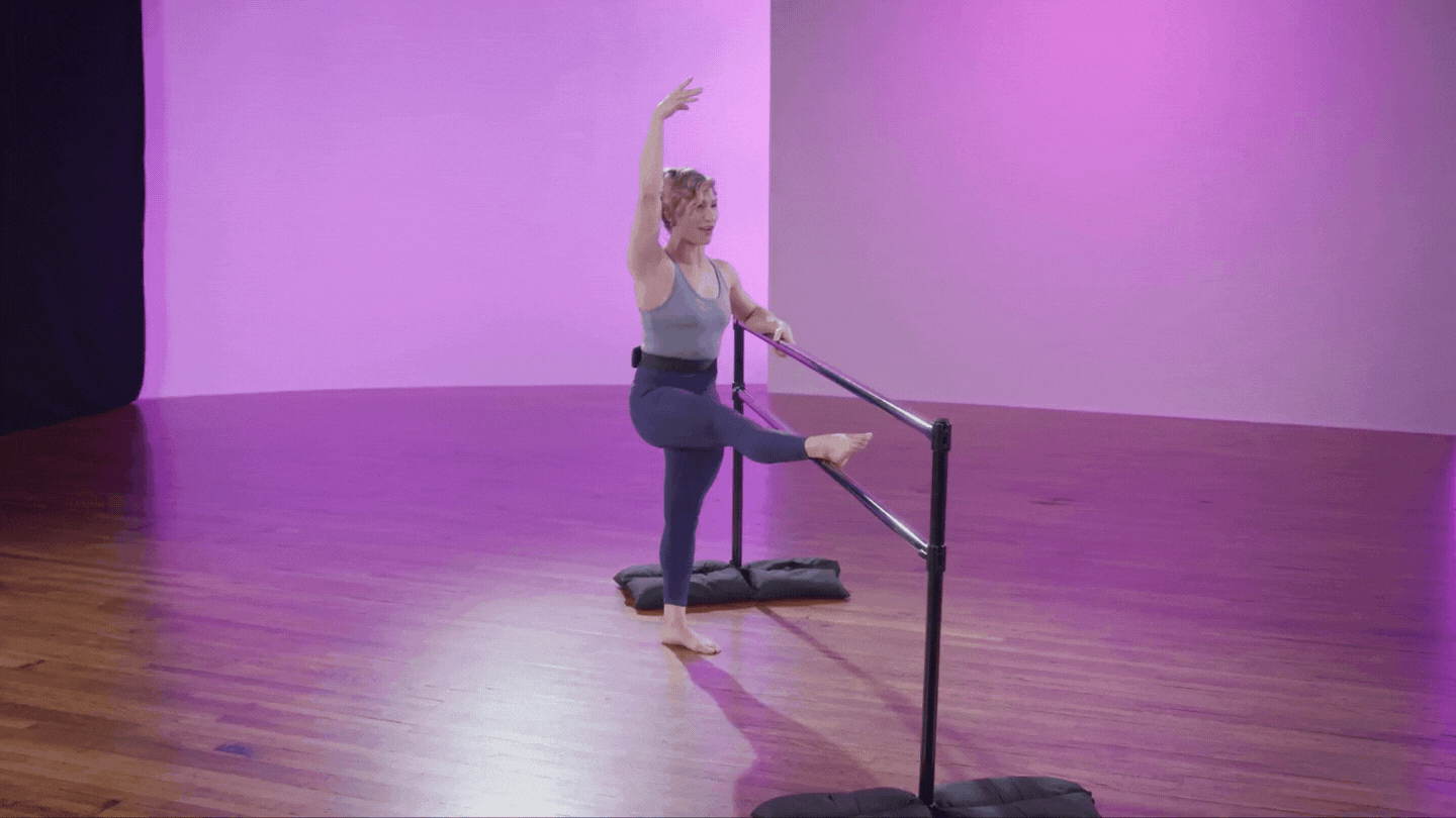 Katie Scharr demonstrating the ballet barre lift off exercise at cli studios. 