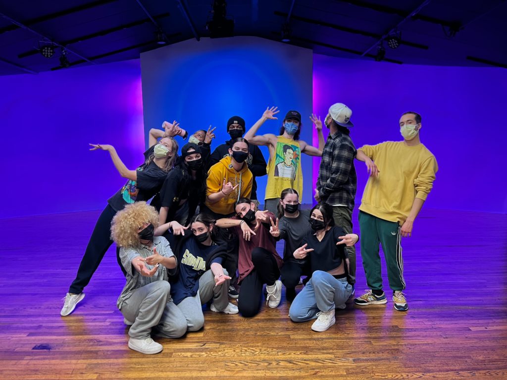 CLI Conservatory Students standing with Marty Kudelka pointing and posing for picture